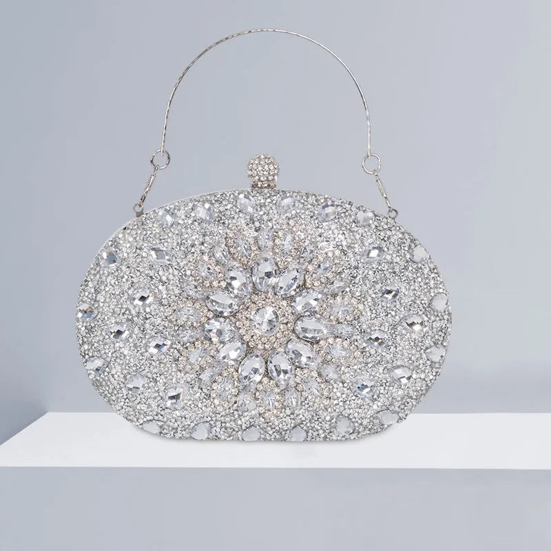 Gold hardware and rhinestone banquet handbag with structured retro design measuring 20cm wide