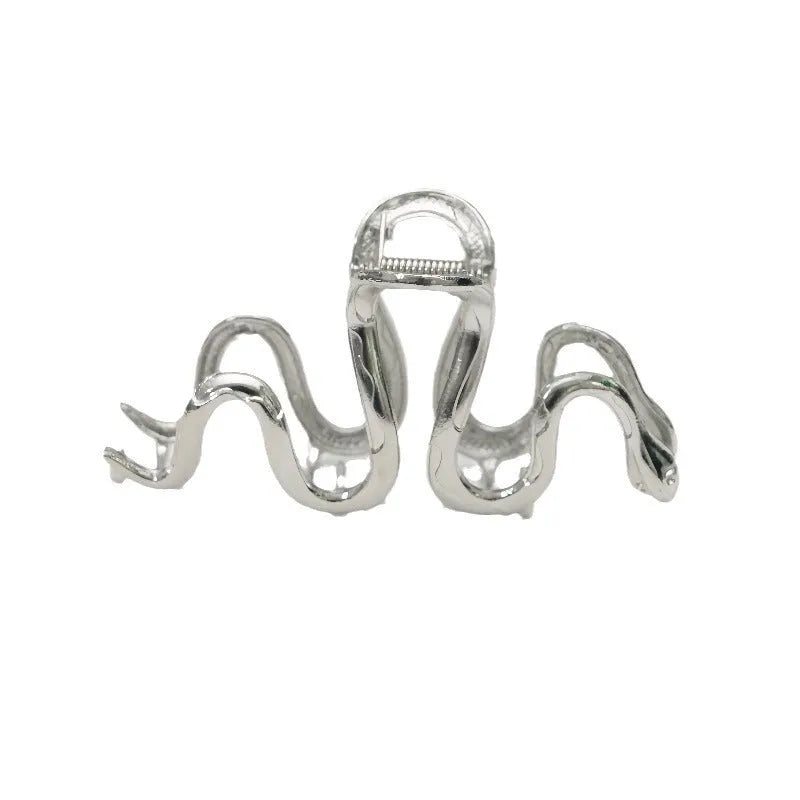 Slytherin serpentine snake design metal hair barrette in silver or gun black, measuring 10.5 cm.