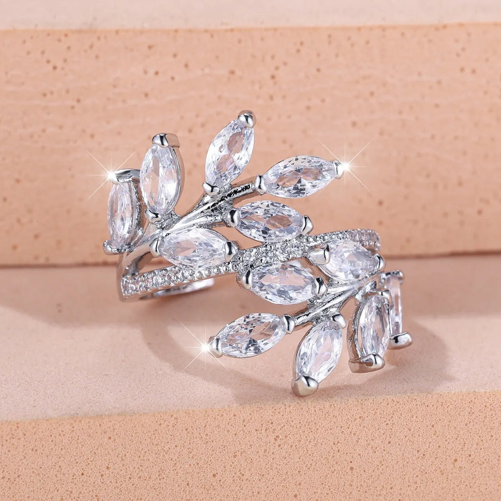 Copper leaf-shaped adjustable ring with Platinum sapphire blue finish