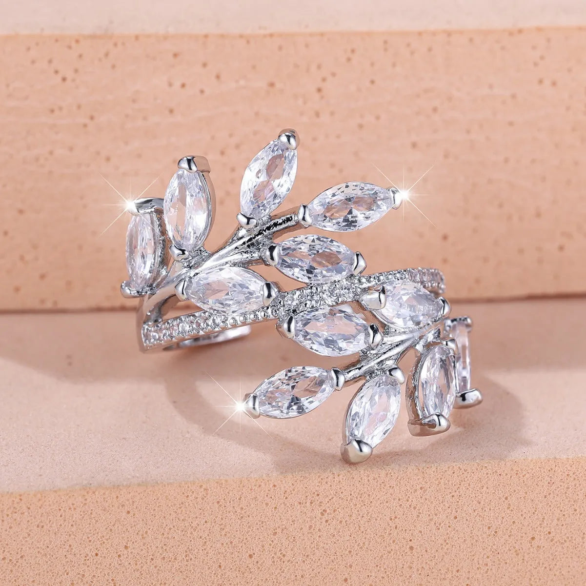 Copper leaf-shaped adjustable ring with Platinum sapphire blue finish