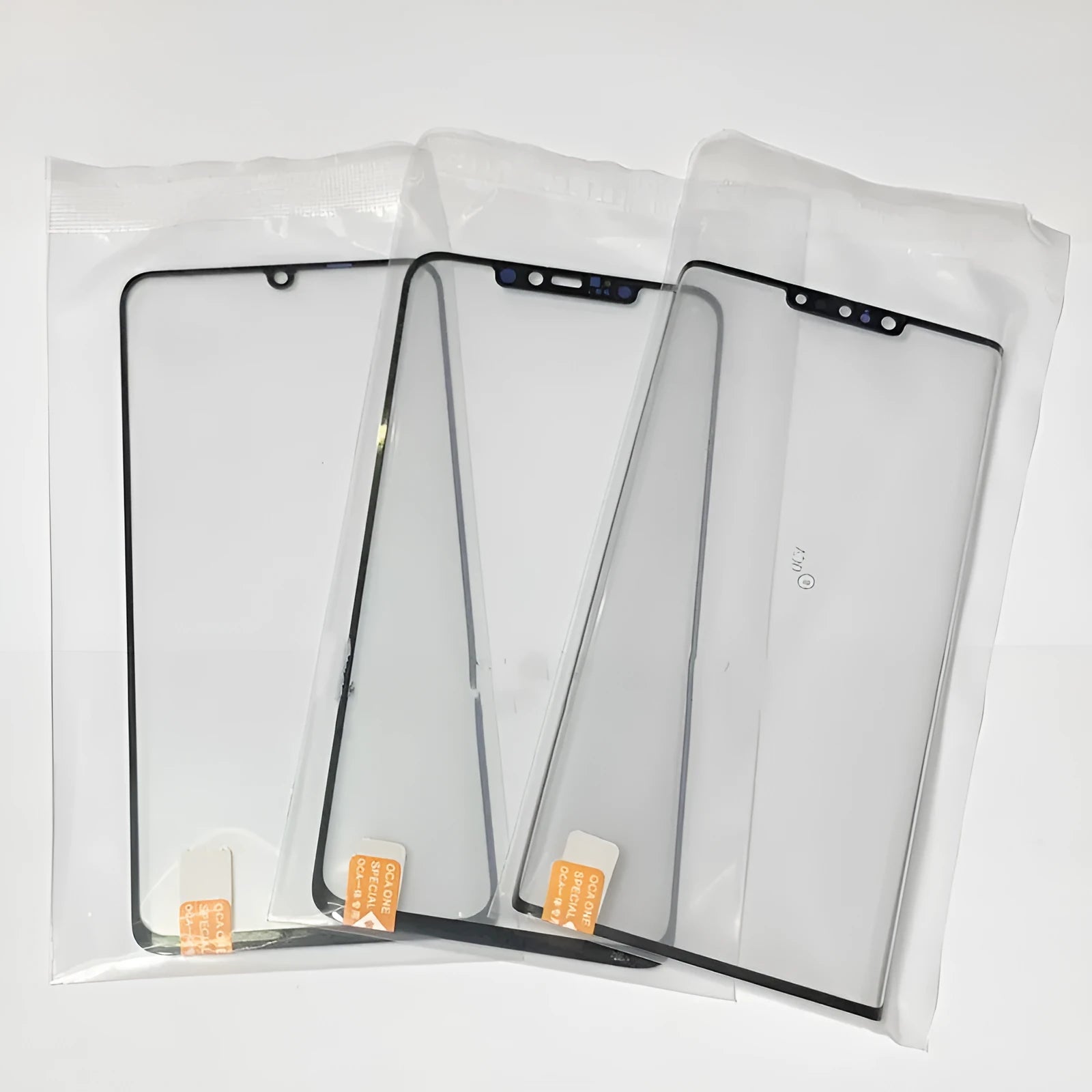 OnePlus 7 Pro replacement touch screen glass panel showing manufacturer logo and clear glass surface