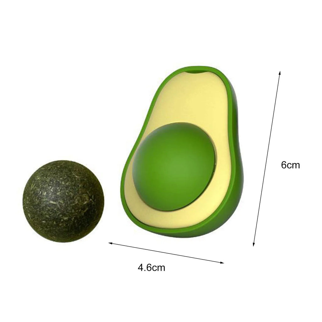 Avocado-shaped catnip wall toy attached to a smooth window with a silvervine ball for cat teeth cleaning