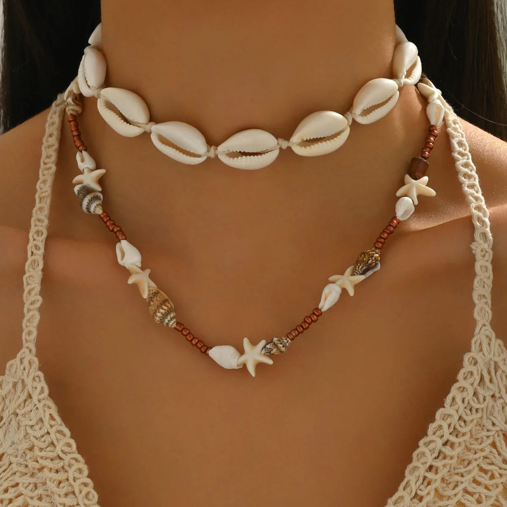 Geometric shell pendant necklace on regular chain in colour X1900