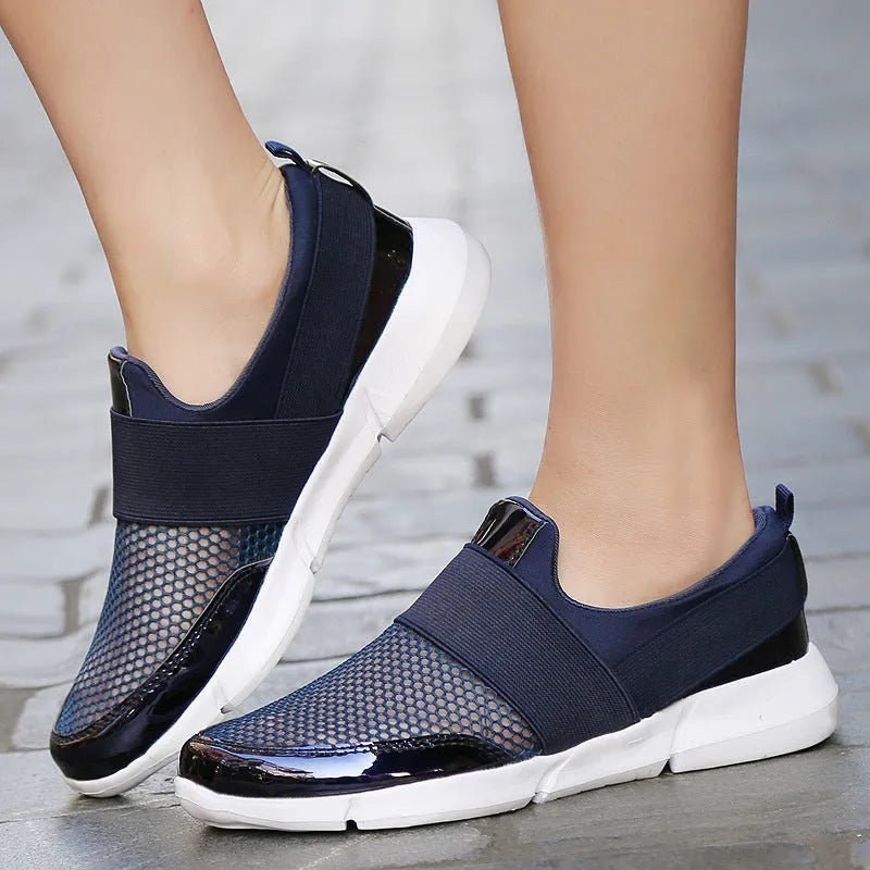 Women's breathable sneakers in black, blue, and grey with mesh lining and low tube design