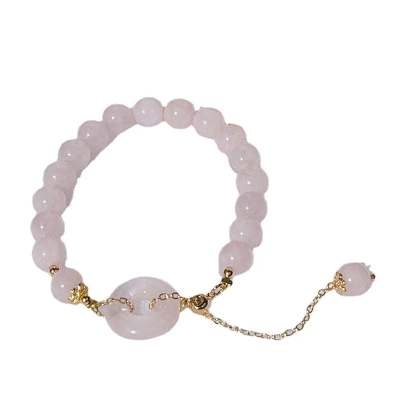 Pink crystal peace buckle bracelet on adjustable silver-plated chain for women