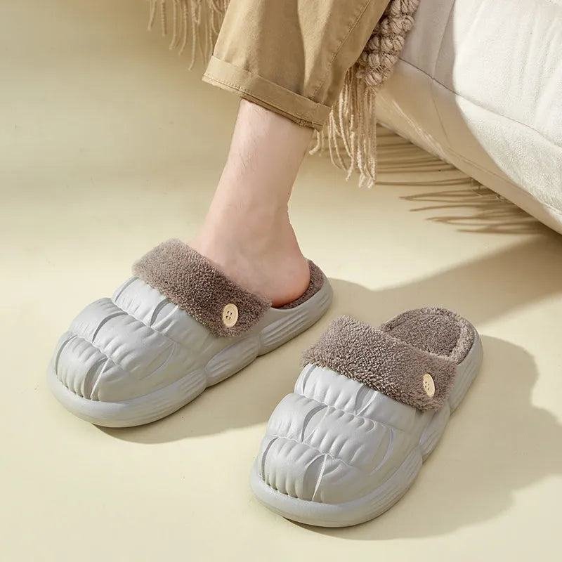 Removable fluffy slippers in beige with faux fur lining and Velcro fastening on a wooden floor
