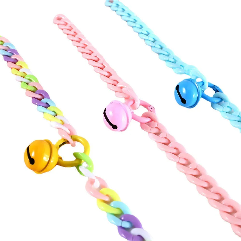 Macaron candy coloured plastic pet collar for cats, dogs and rabbits on a white background.