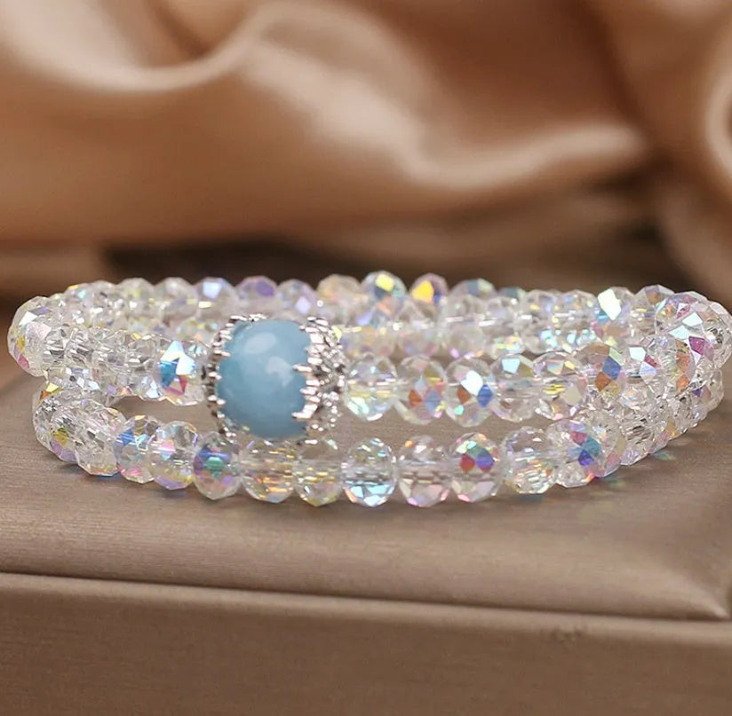 White crystal double ring bracelet for women with electroplated finish on light background
