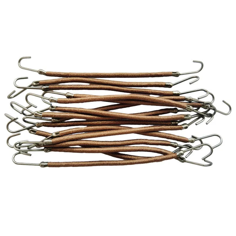 Close-up of a solid colour double hook hair tool for securing wigs and hair wefts.