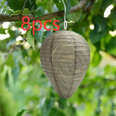 White beehive-shaped paper lantern with honeycomb texture, shown hanging.