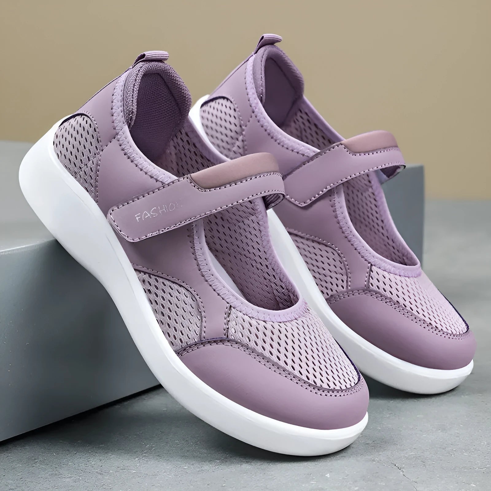 Women's grey mesh slip-on casual shoes with Velcro fastening and flat polyurethane sole