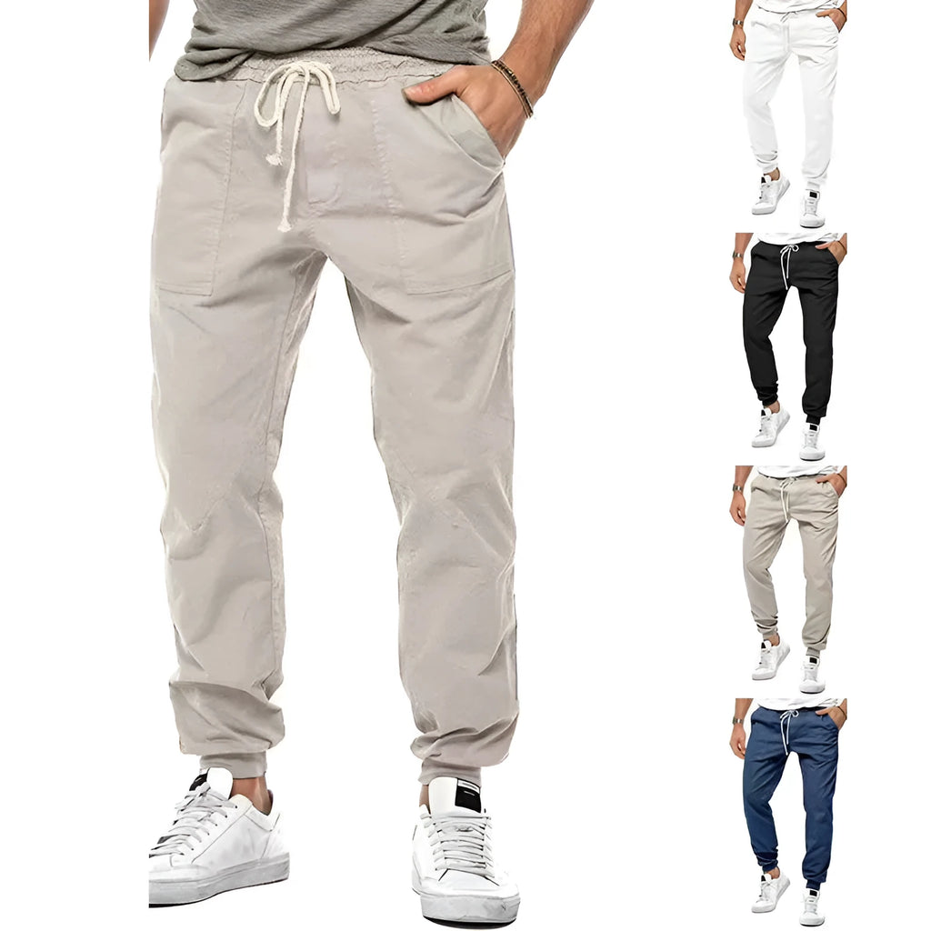 Men's loose tapered casual trousers with drawstring waist and ankle bands in solid colour