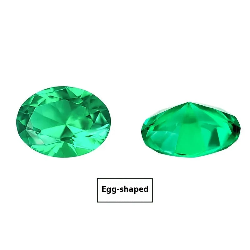 A loose cultivated emerald gemstone in a columbia green treasure colour on a white background.