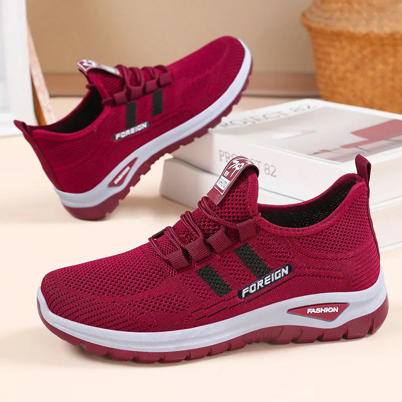 Low-top breathable mesh casual shoes with a flat PVC sole in black, available in multiple sizes.