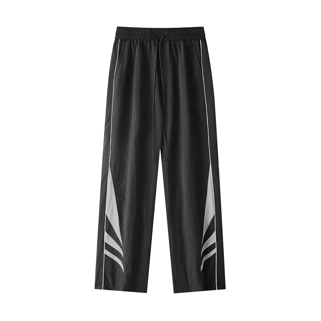 Plus-size men's straight-leg casual sports trousers in grey, showing loose fit and elastic waist.