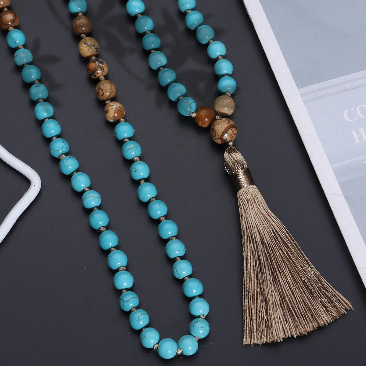 Long blue pine vintage turquoise painted stone mala necklace with 108 geometry beads on a ball bead chain.