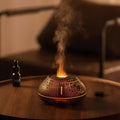 Round desktop humidifier with colourful flame simulation effect and USB power connection
