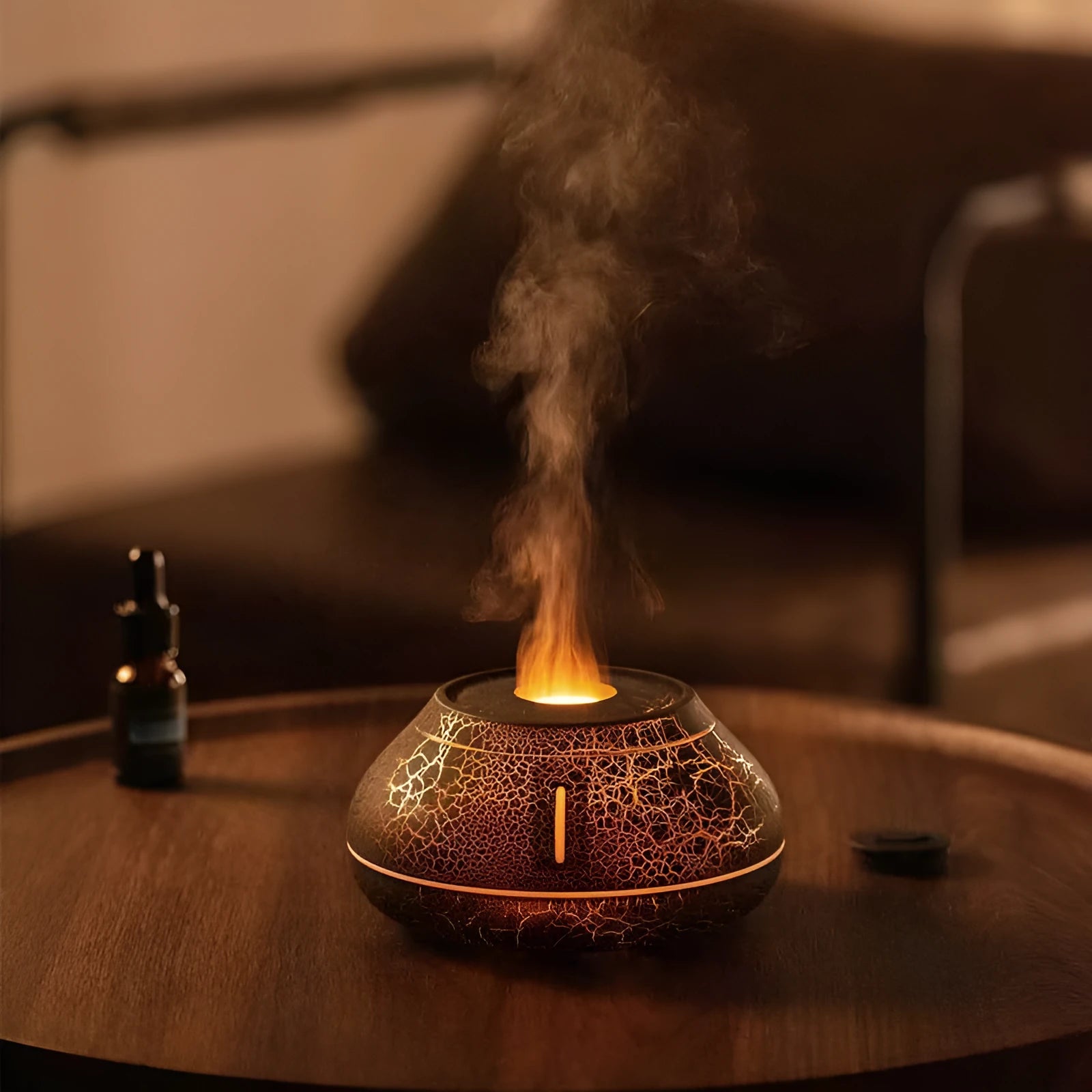 Round desktop humidifier with colourful flame simulation effect and USB power connection