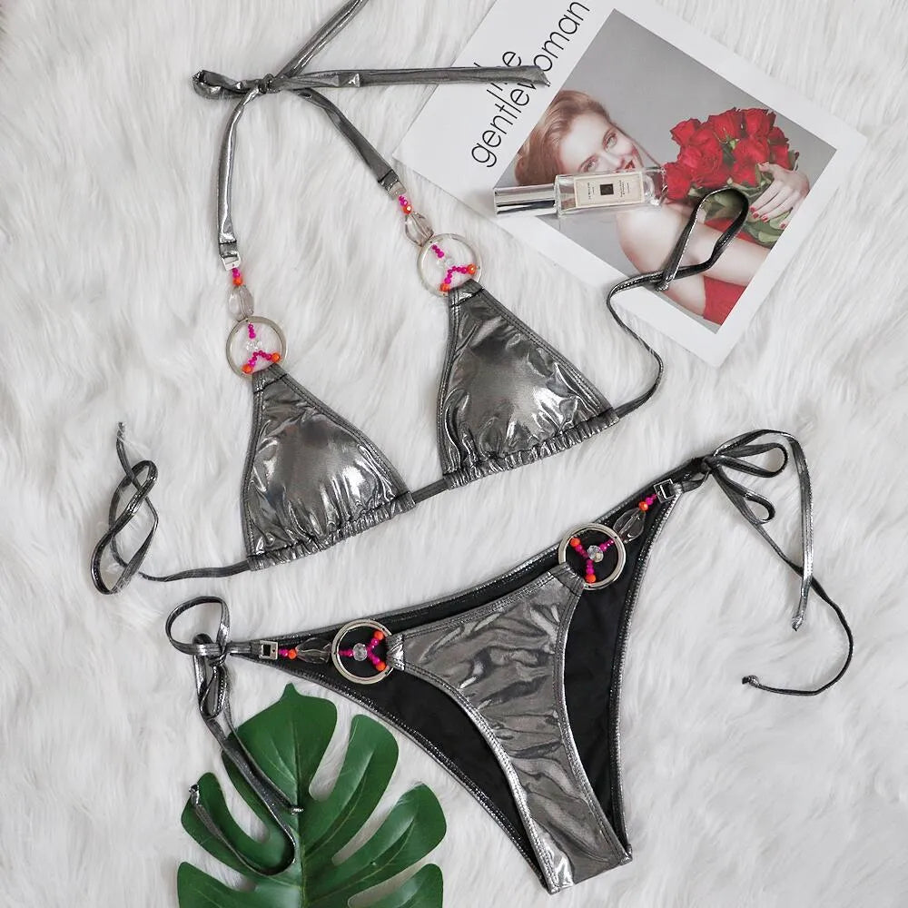 Silver women's bikini swimsuit with briefs style on a mannequin
