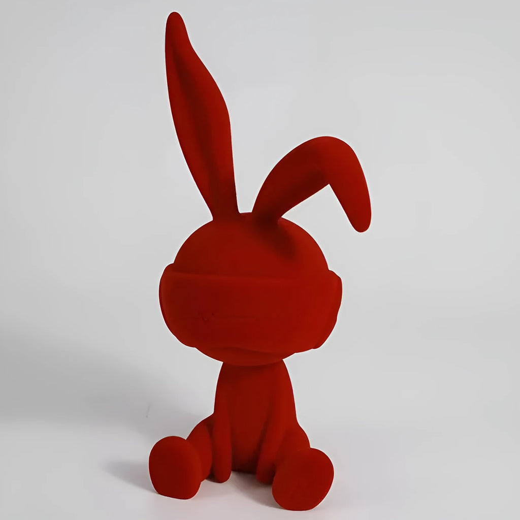 Suede blindfold rabbit resin table ornament in blue, green, or red colour.