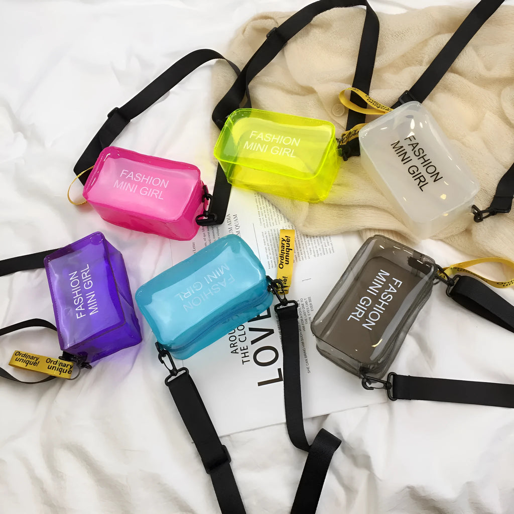 Transparent square jelly shoulder bag in PC material with an adjustable strap, shown in a light colour.