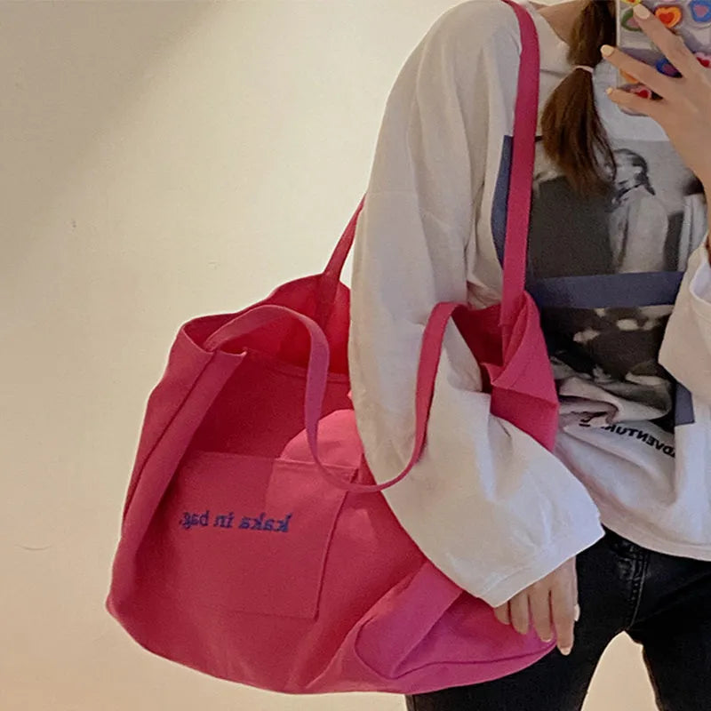 Large capacity canvas shopping tote bag in solid colour, suitable for shoulder carry