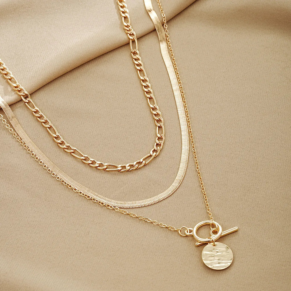 Retro multi-layer snake chain necklace in zinc alloy, available in two or three layers, unisex casual style