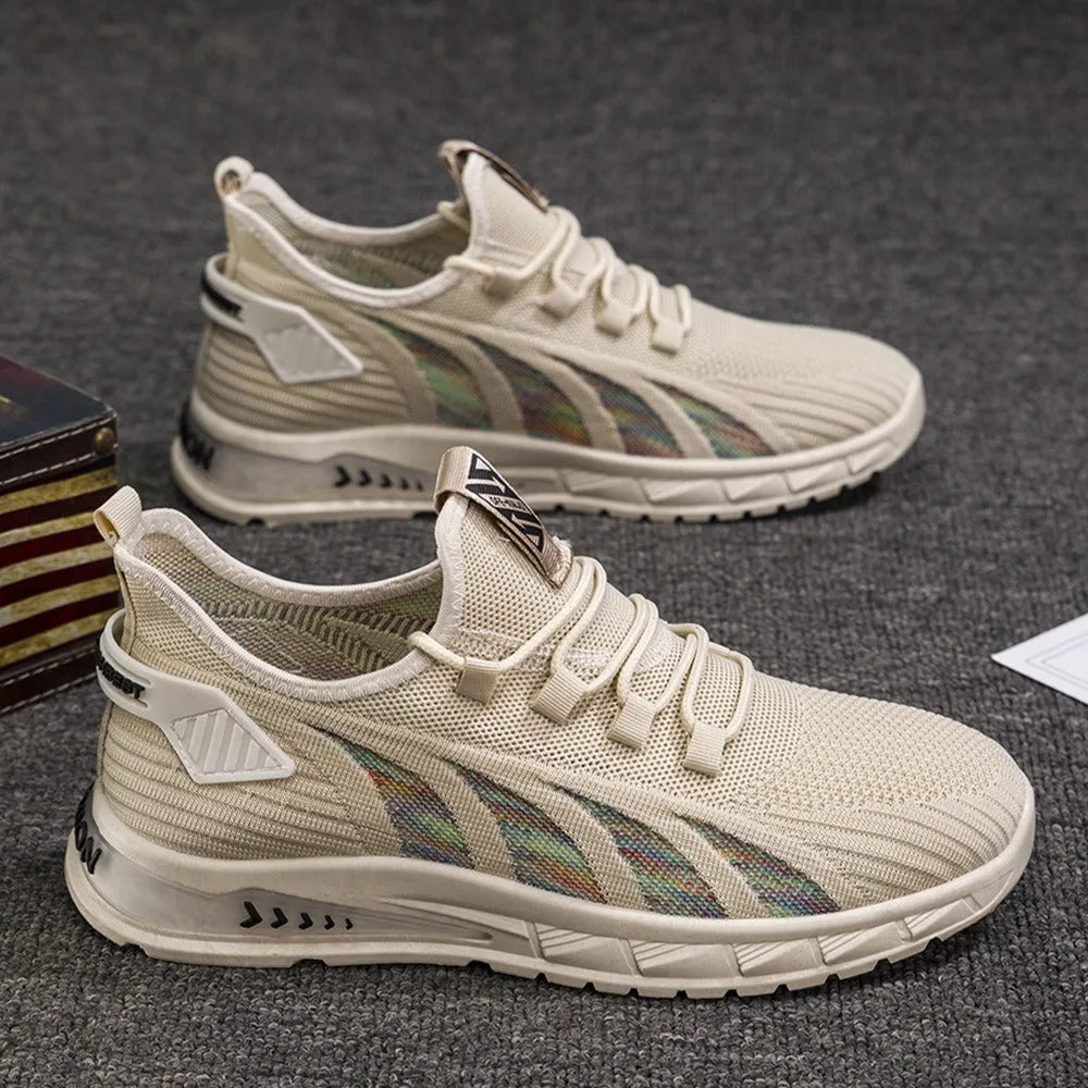 Low-top mesh sneakers in various colours on a flat sole, showing the shallow-cut upper.
