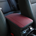 Black PU leather car armrest box cushion mat measuring 32 by 19 centimetres.