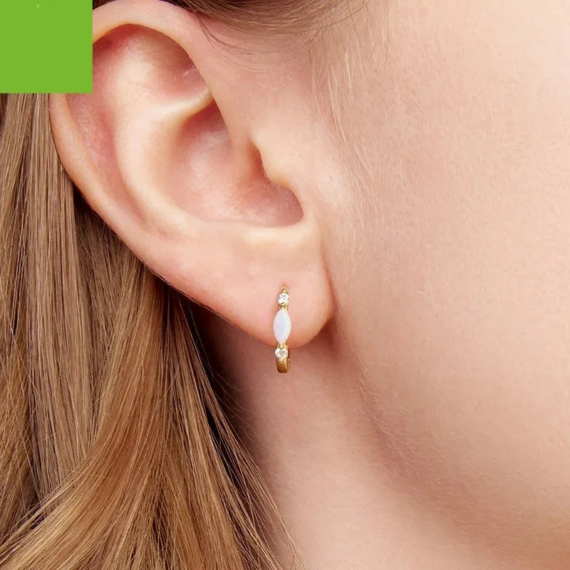Moissanite simple opal ear ring clip in S925 sterling silver with gold finish, featuring moissanite and opal stones on a smooth clip-on setting