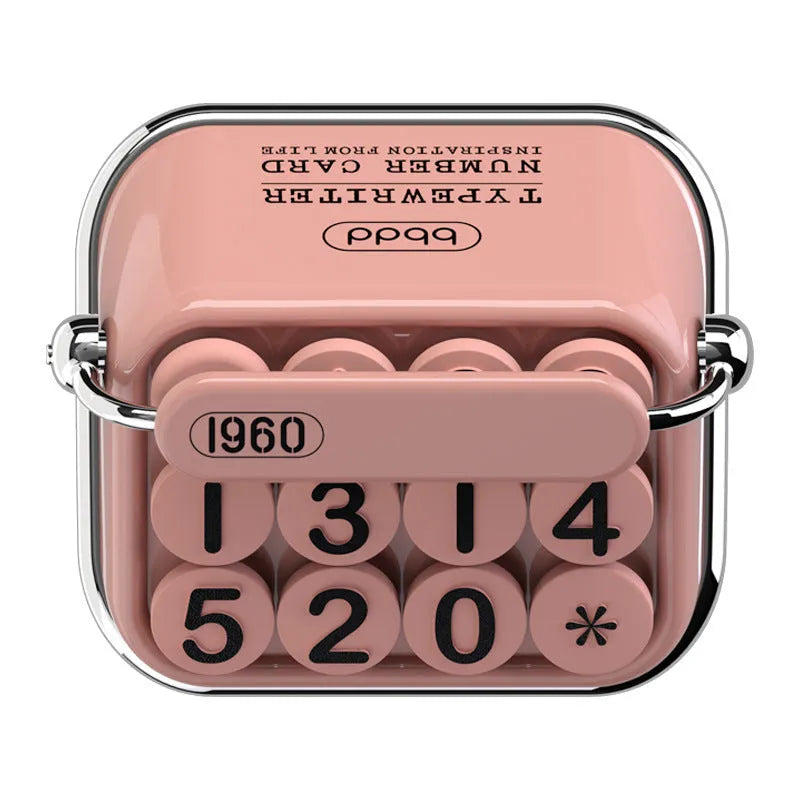 Creative typewriter-style temporary parking number plate in zinc alloy and ABS on a desk