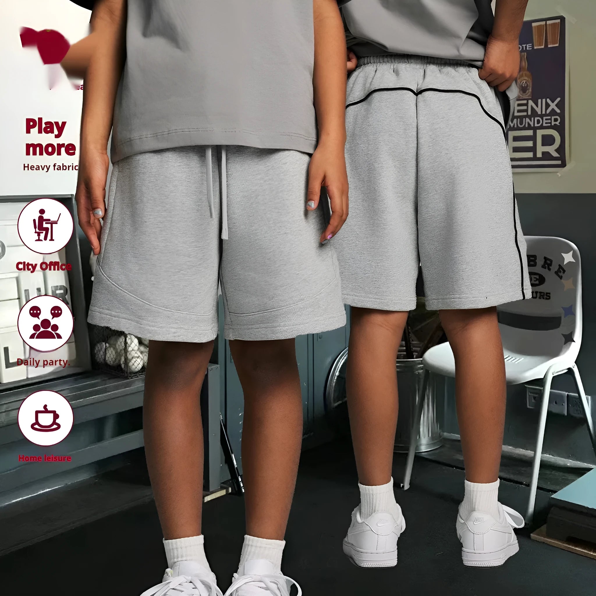 Child wearing solid colour loose cotton sports shorts in a neutral shade.