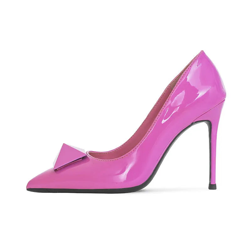 Pink patent leather women's stiletto heels with pointed toe, adjustable ankle buckle, and a slender high heel.