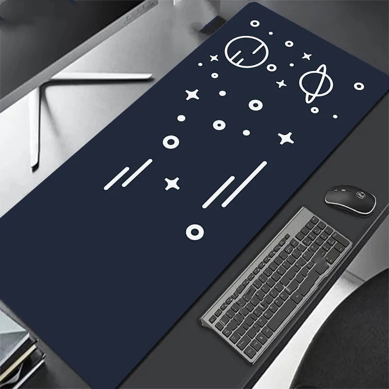 All black extra long mouse pad with precision overlock stitching on a desk