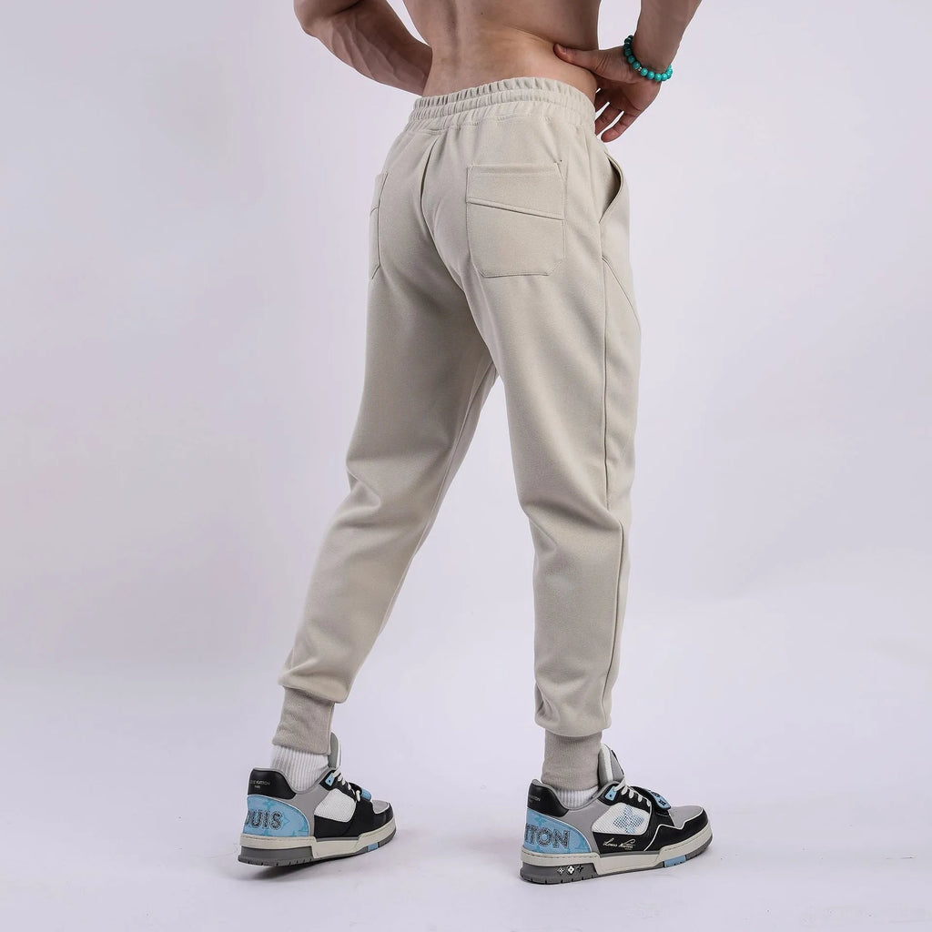 Men's casual trousers with ankle drawstring in polyester cotton fabric available in five colours