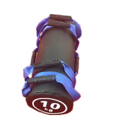 Flat white PVC fitness sandbag for weight training on a gym floor.
