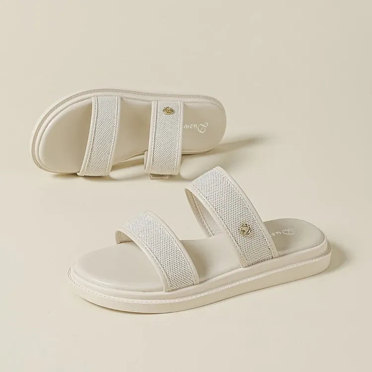 Brown retro-style women's flip-flops with a soft sole and artificial PU upper.