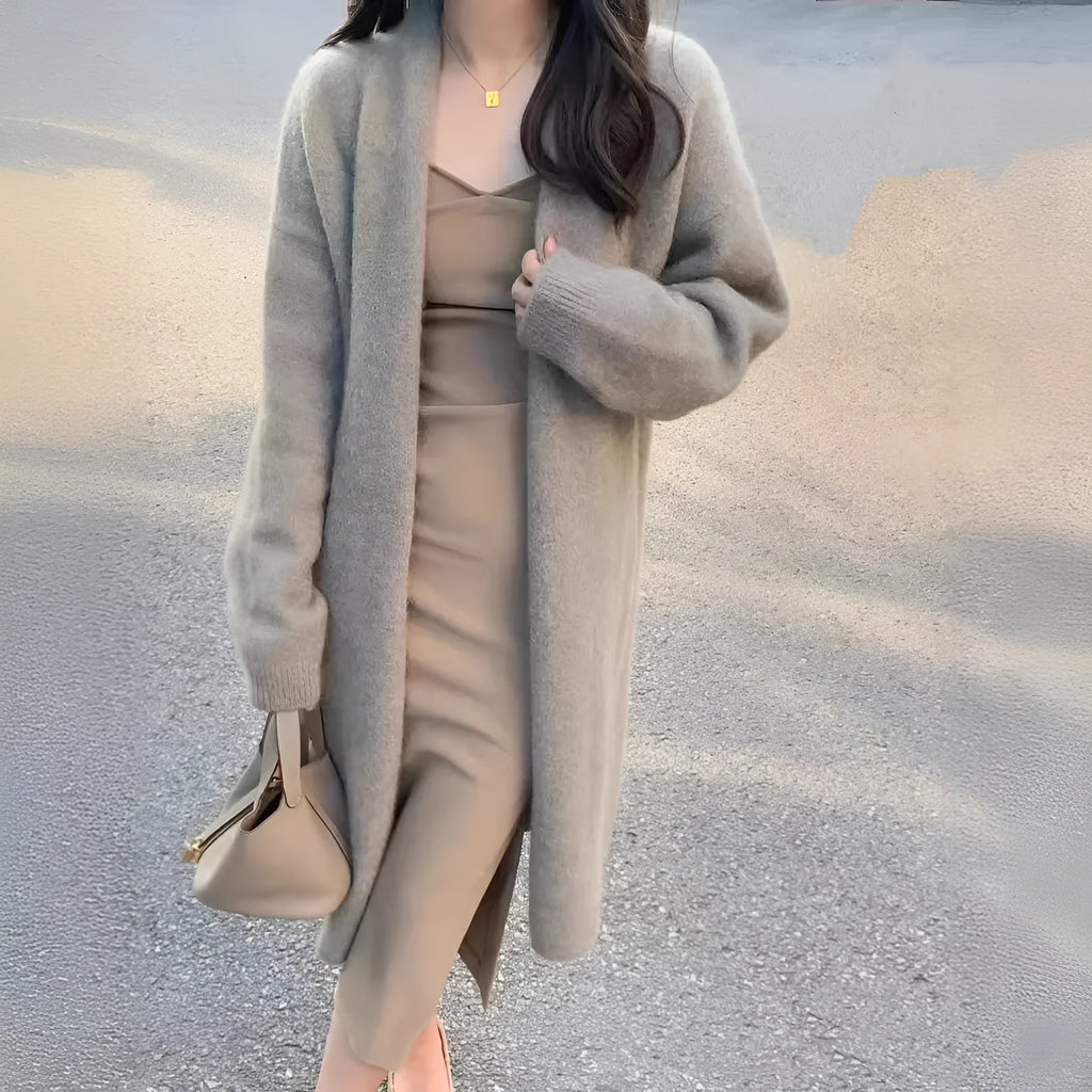 Women's loose fit V-neck knitted cardigan in khaki colour, showing medium length and long sleeves.