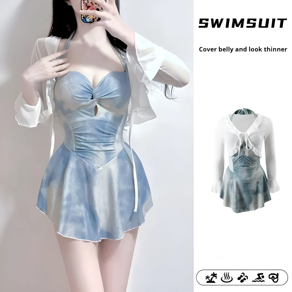 Blue women's conservative one-piece swimsuit with long sleeves in milk silk fabric