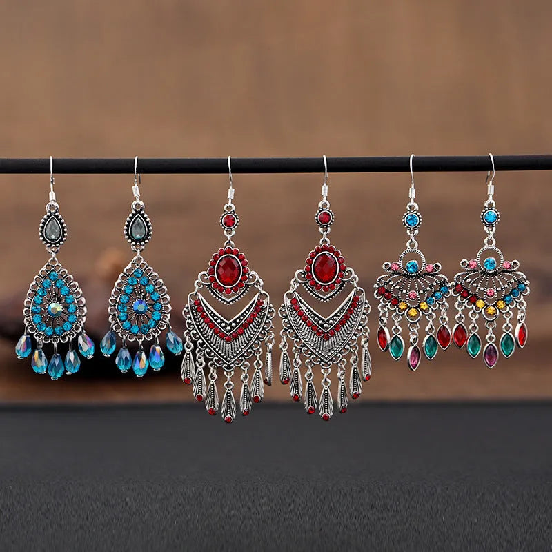 Purple retro crystal long fringe drop earrings with ethnic style details on an alloy base.