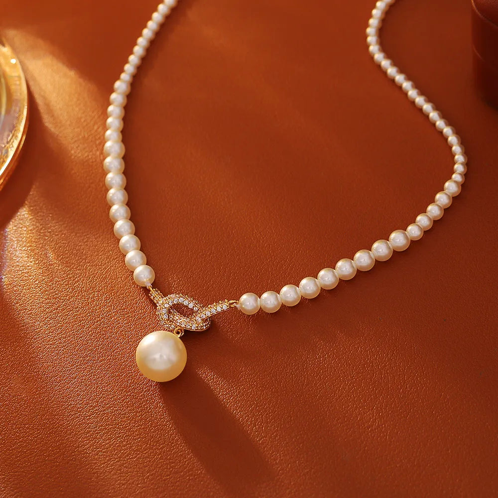 Knotted pearl pendant necklace with geometric brass micro inlay design for women
