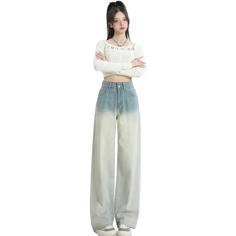 Women's wide-leg straight-cut denim trousers in a gradient blue colour wash.