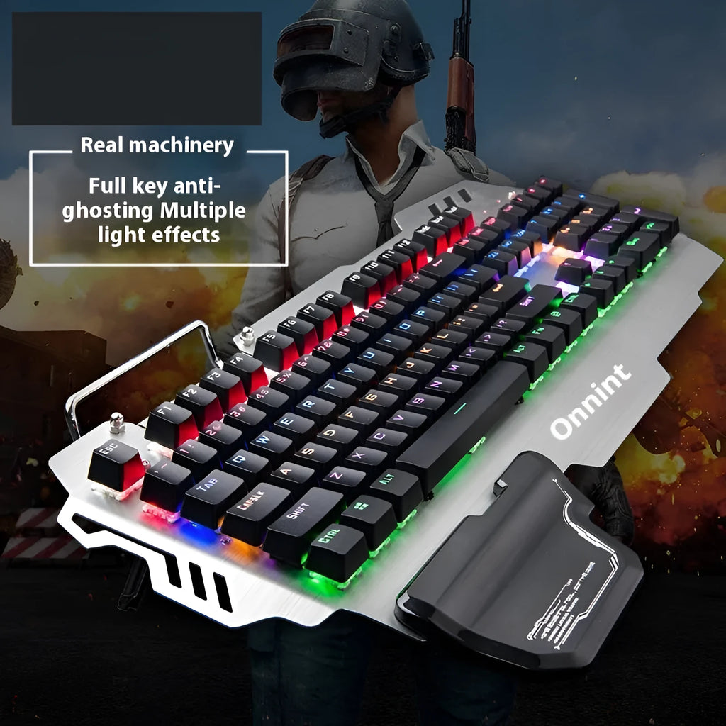 Silver metal gaming keyboard with detachable wrist splint on desktop