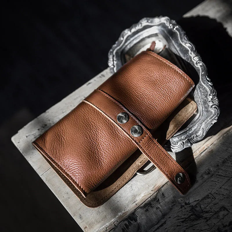 Handmade vintage style cow leather wallet with tape closure measuring 20x10x4cm