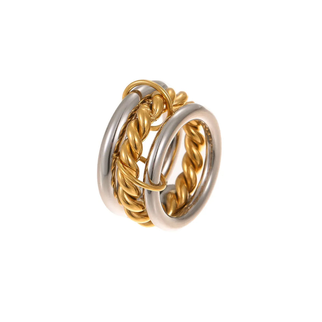 Stacked stainless steel rings with 18K gold plating in multiple colour options on a woman's hand.