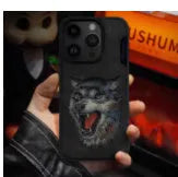 Red embroidered lion design TPU mobile phone case for iPhone 15 Pro Max on a surface