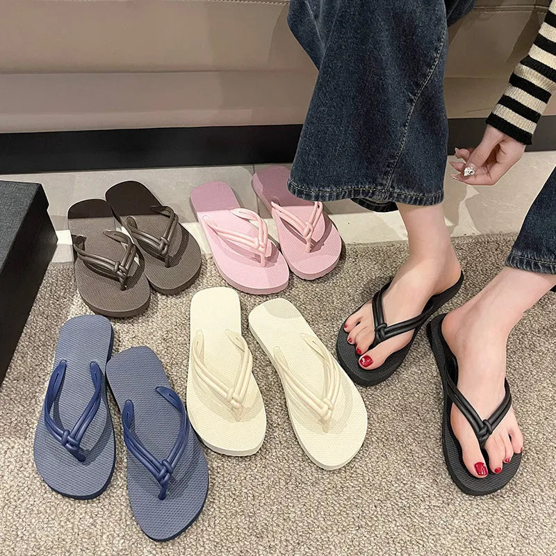 Men's PVC flip flops with toe covering in five colour options showing injection moulded sole detail