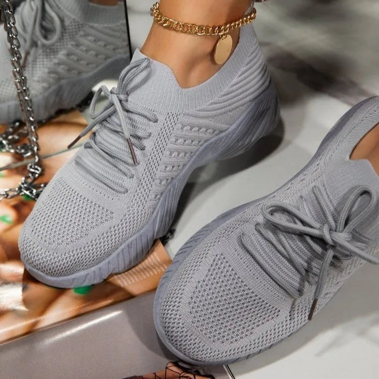 Women's sneakers with thick rubber soles in eight colour options including white, red, blue, black, khaki, grey, pink, and light blue