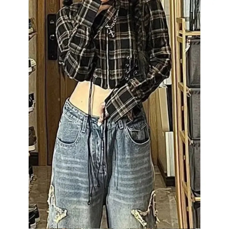 Blue denim women's jeans with high waist and wide straight leg cut