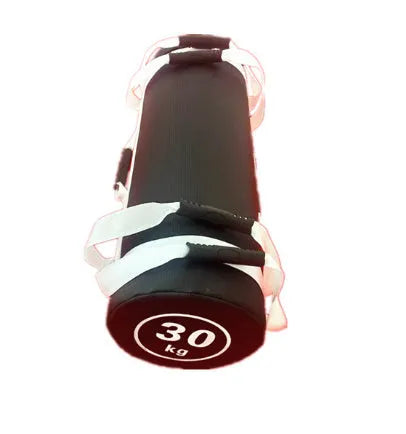 Flat white PVC fitness sandbag for weight training on a gym floor.